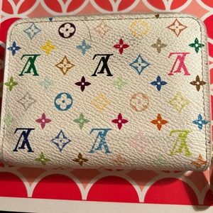 Louis Vuitton small zippy wallet.